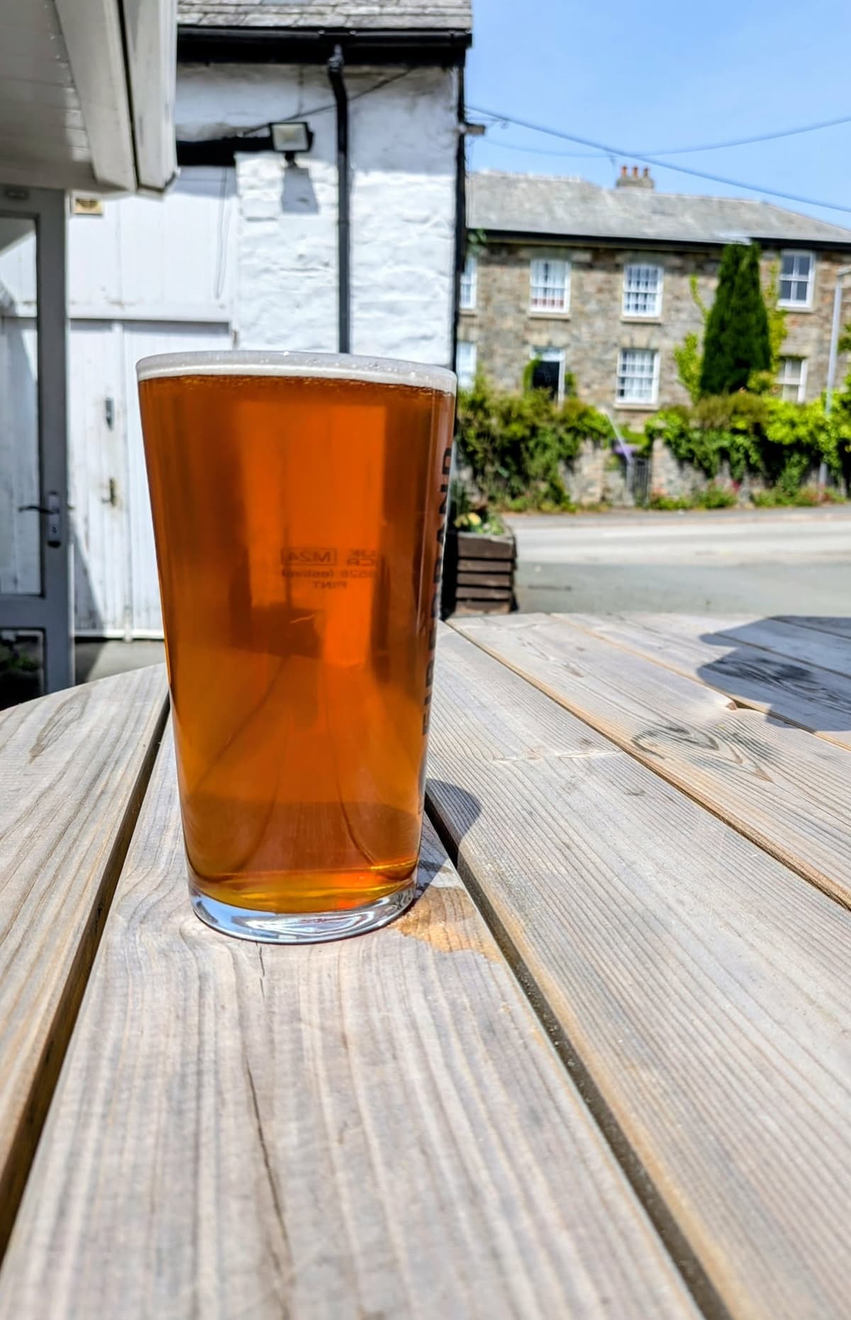 Pint outside on a sunny day at the White Horse Inn Launceston