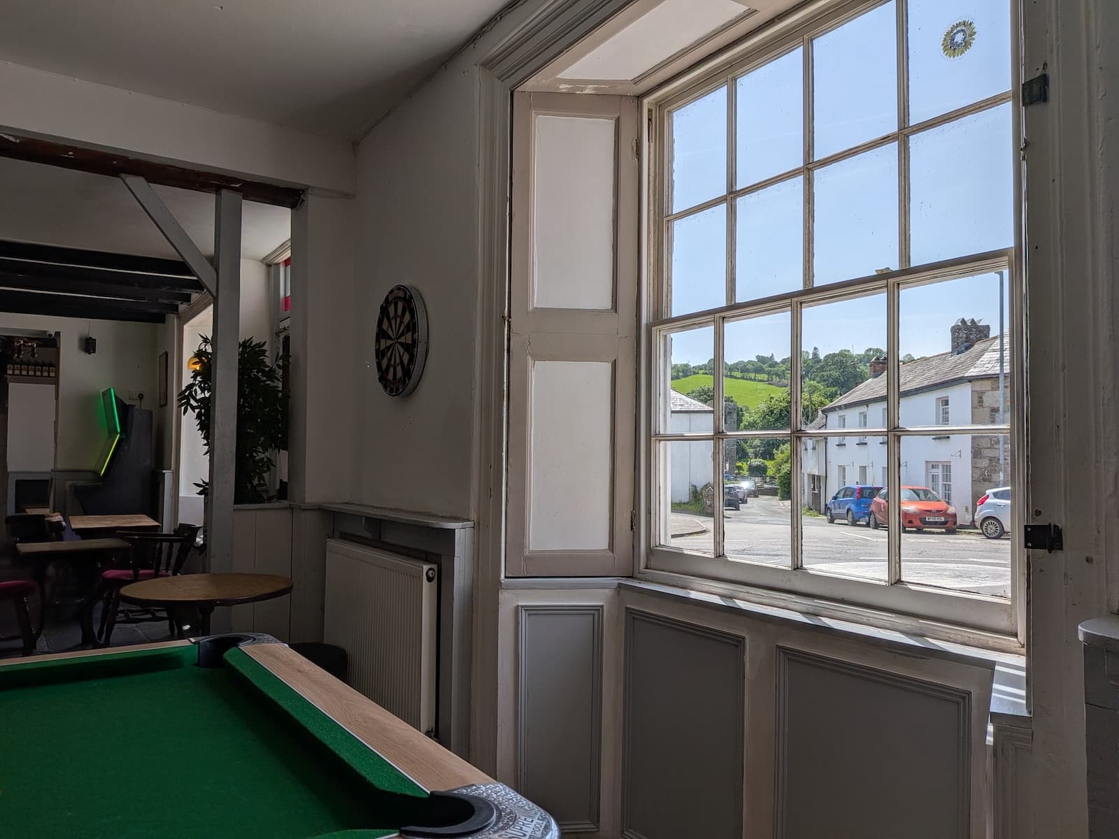 Pool table and dart board area at the White Horse Inn Launceston